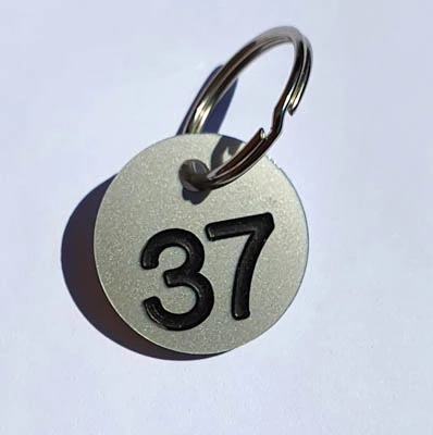 Key fob laminate withsplit ring