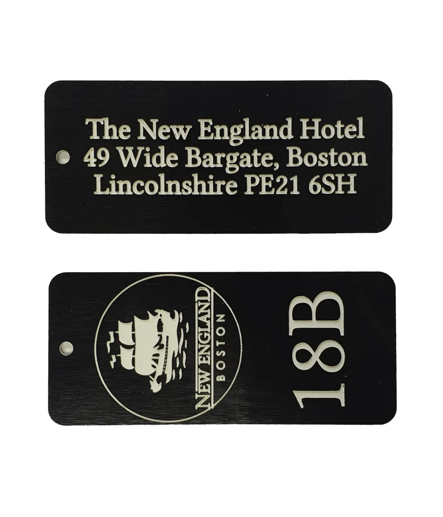Custom engraved key fobs with numbers and colours for hotel and gym use